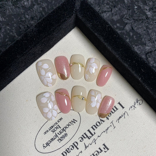 Medium Oval Lotus Pink & Hand-Painted White Flowers Handmade Press-On Nails | Removable and Reusable | Free Tool Kit Included